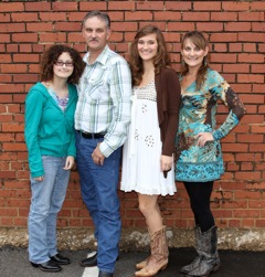This was taken after Kerri sang and fiddled in the 20th Anniversary of the Red Steagall Competition on North Side in Fort Worth this year.  L to R:  Nikki, Tim, Kerri and Dana !